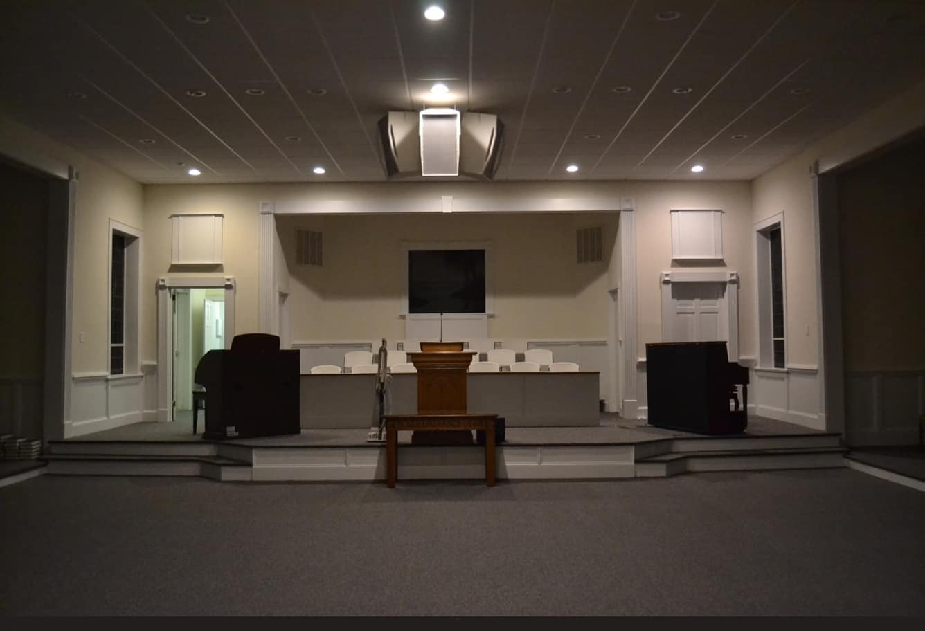 Sanctuary and Pulpit After Renovation (2014) Completed sanctuary and pulpit at Rawls Baptist Church after the 2013–2014 renovation, featuring updated stage design, lighting, and seating.