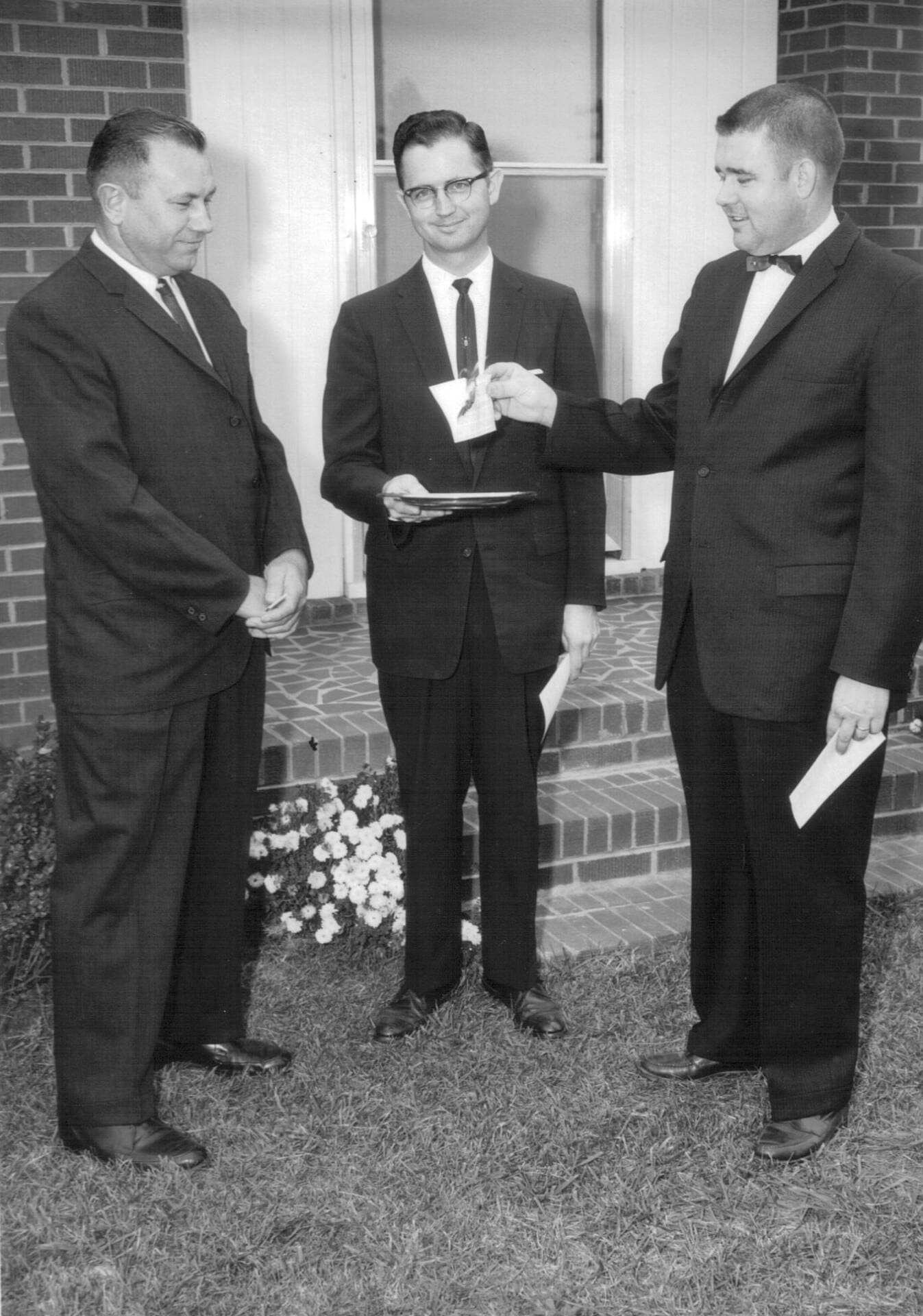 1962 – Note Burning 2 The burning of the parsonage mortgage note at Rawls Baptist Church in Fuquay-Varina, NC, December 22, 1962, with Pastor Julian Motley and church leaders present.
