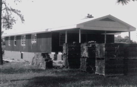 Parsonage Under Construction — July 1960 Construction of the Rawls Baptist Church parsonage in Fuquay-Varina, NC, during July 1960, showing progress and congregation involvement.
