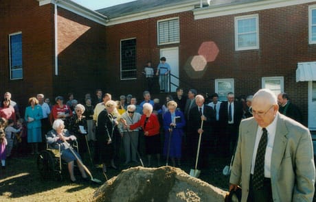 Groundbreaking Ceremony, 2005 Church members and leaders gather outside Rawls Baptist Church in Fuquay-Varina, NC, for the groundbreaking ceremony marking the start of the 2005 building expansion.