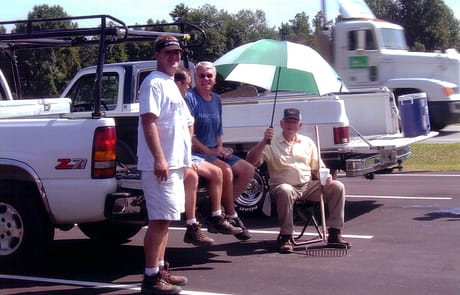 Taking a Break Together, 2005 Rawls Baptist Church volunteers relaxing in the parking lot after a day of work during the 2005 expansion project.