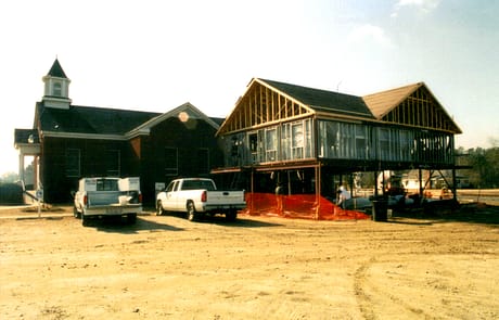 Framing the Fellowship Wing, 2005 Roof trusses installed over the steel framework during construction of the 2005 Rawls Baptist Church addition.