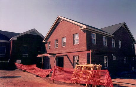 Brickwork Nears Completion, 2005 The new two-story addition at Rawls Baptist Church showing exterior brickwork nearing completion, with details closely matching the original sanctuary.