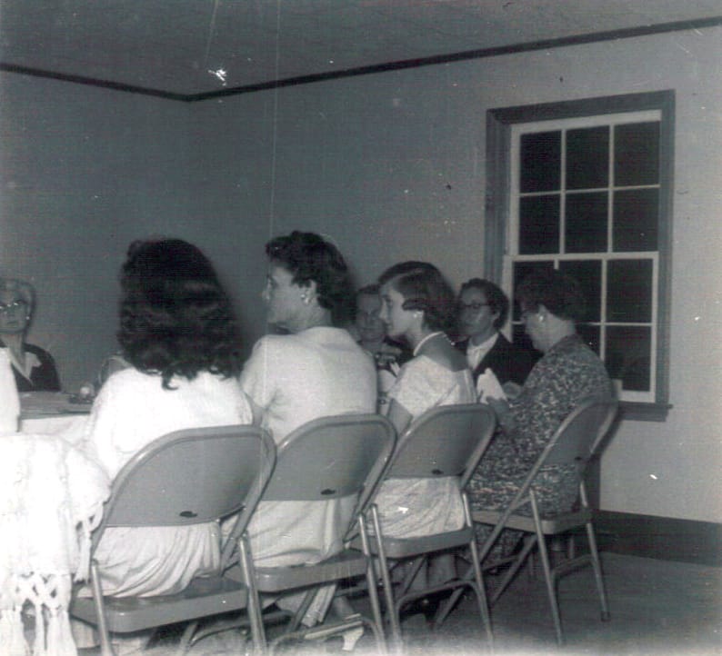 Gathering in Grace — GA Banquet Memories Members of Rawls Baptist Church attending the GA Mother-Daughter Banquet, May 1957 — celebrating faith and family fellowship.