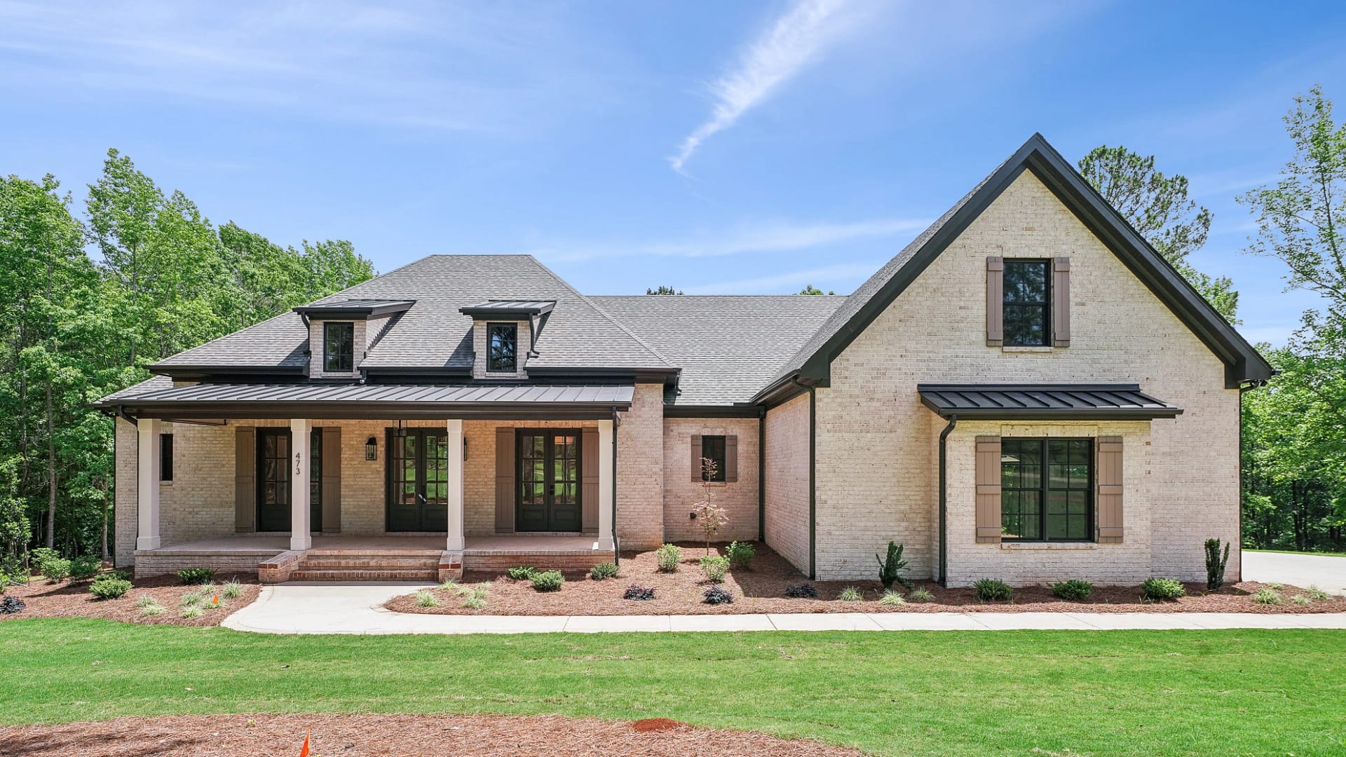 Front exterior view of traditional custom home in Holly Springs, North Carolina