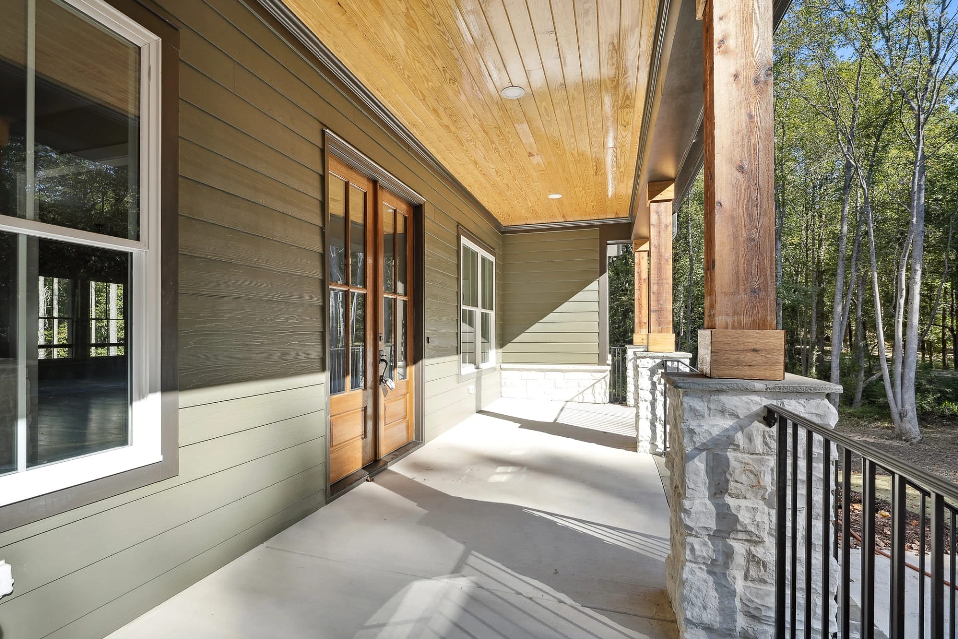 Covered porch detail of a custom home in Holly Springs, North Carolina
