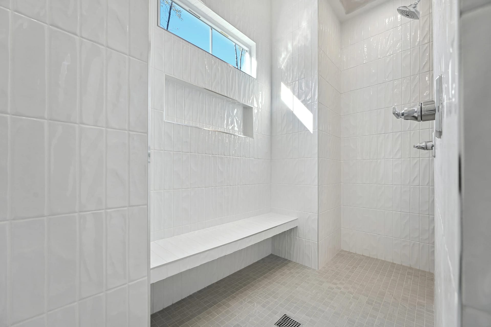 Walk-in tiled shower in a custom home in Holly Springs, North Carolina
