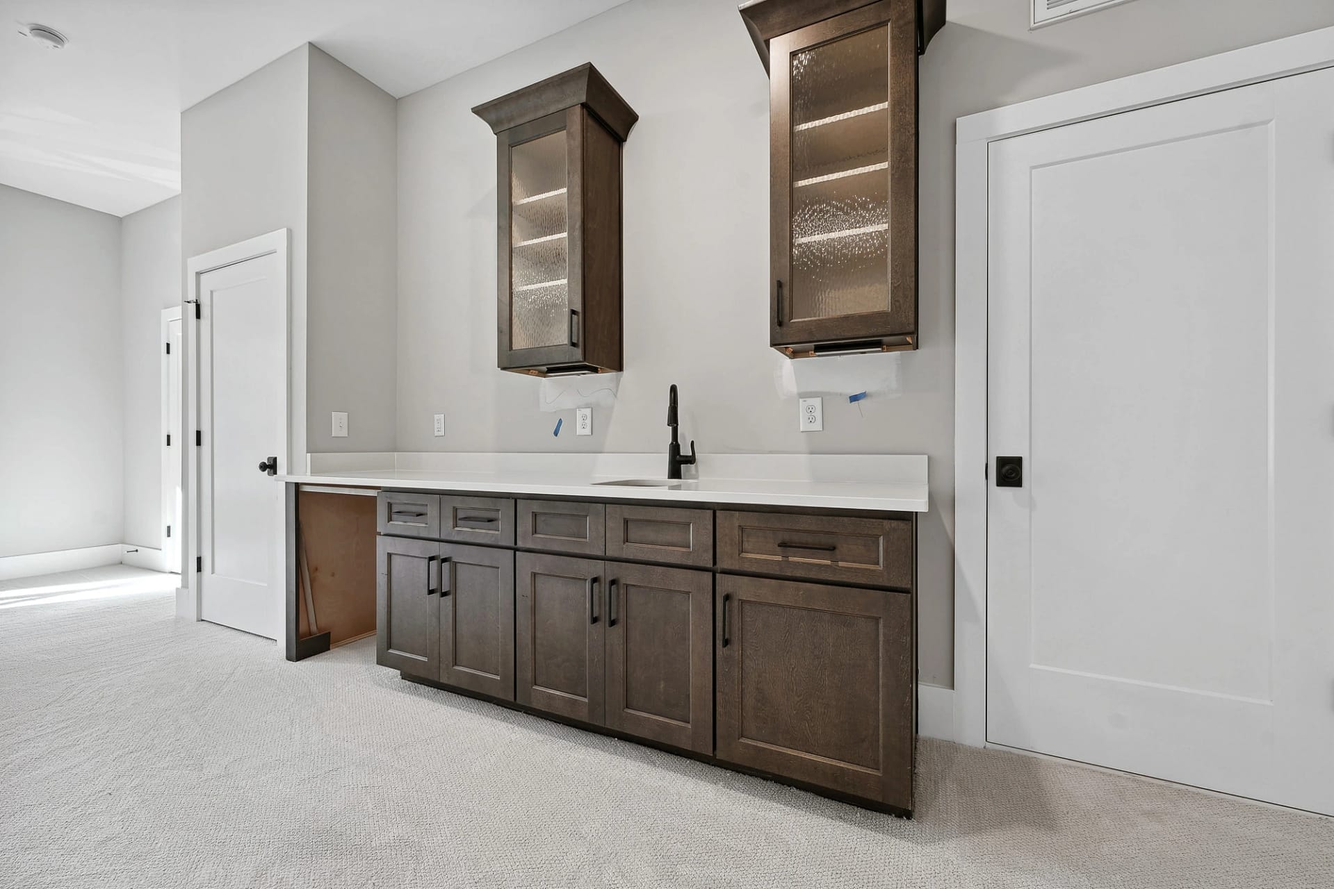 Ensuite bathroom with custom cabinetry in a Holly Springs home