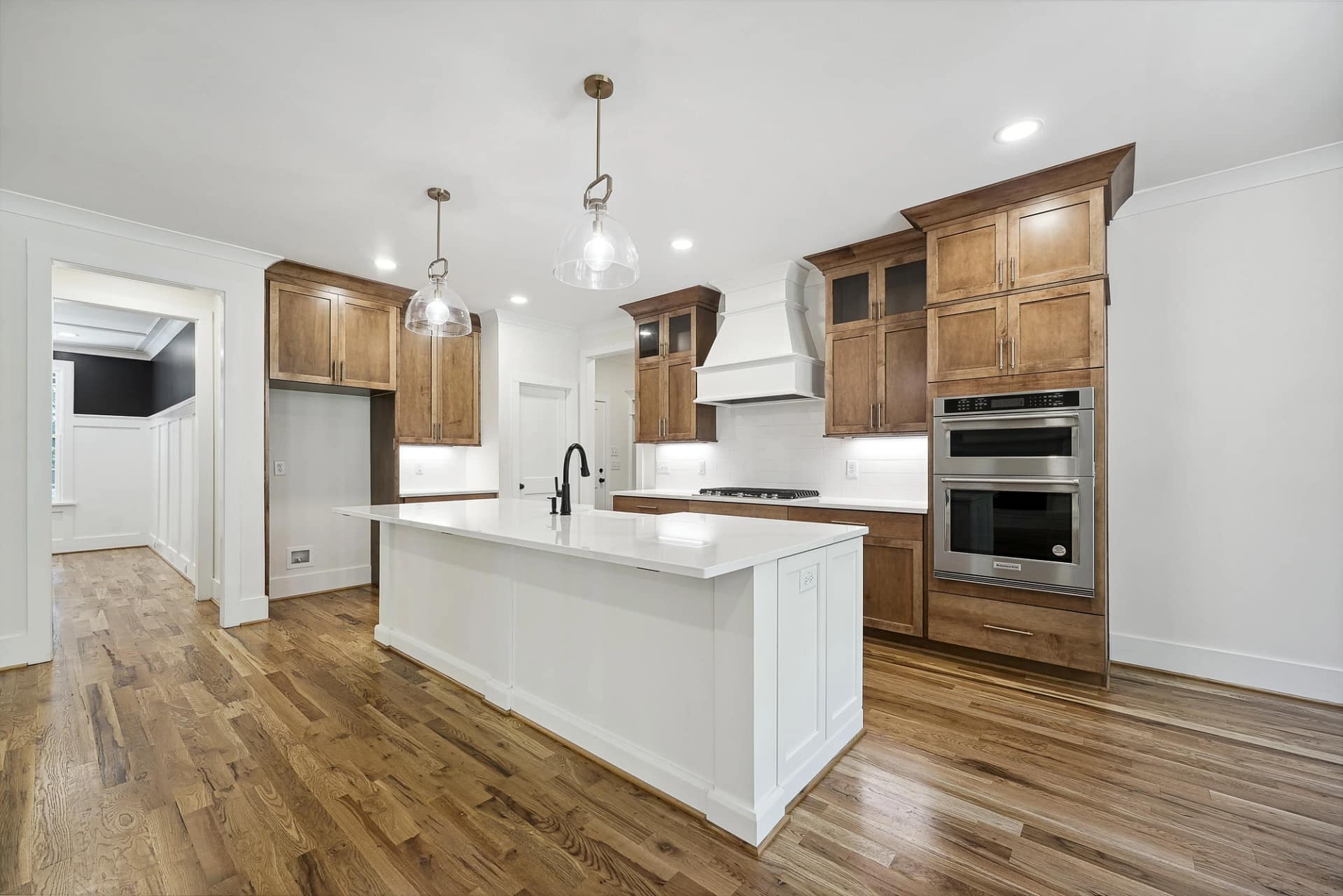 Kitchen with center island in a new construction home in Holly Springs, North Carolina