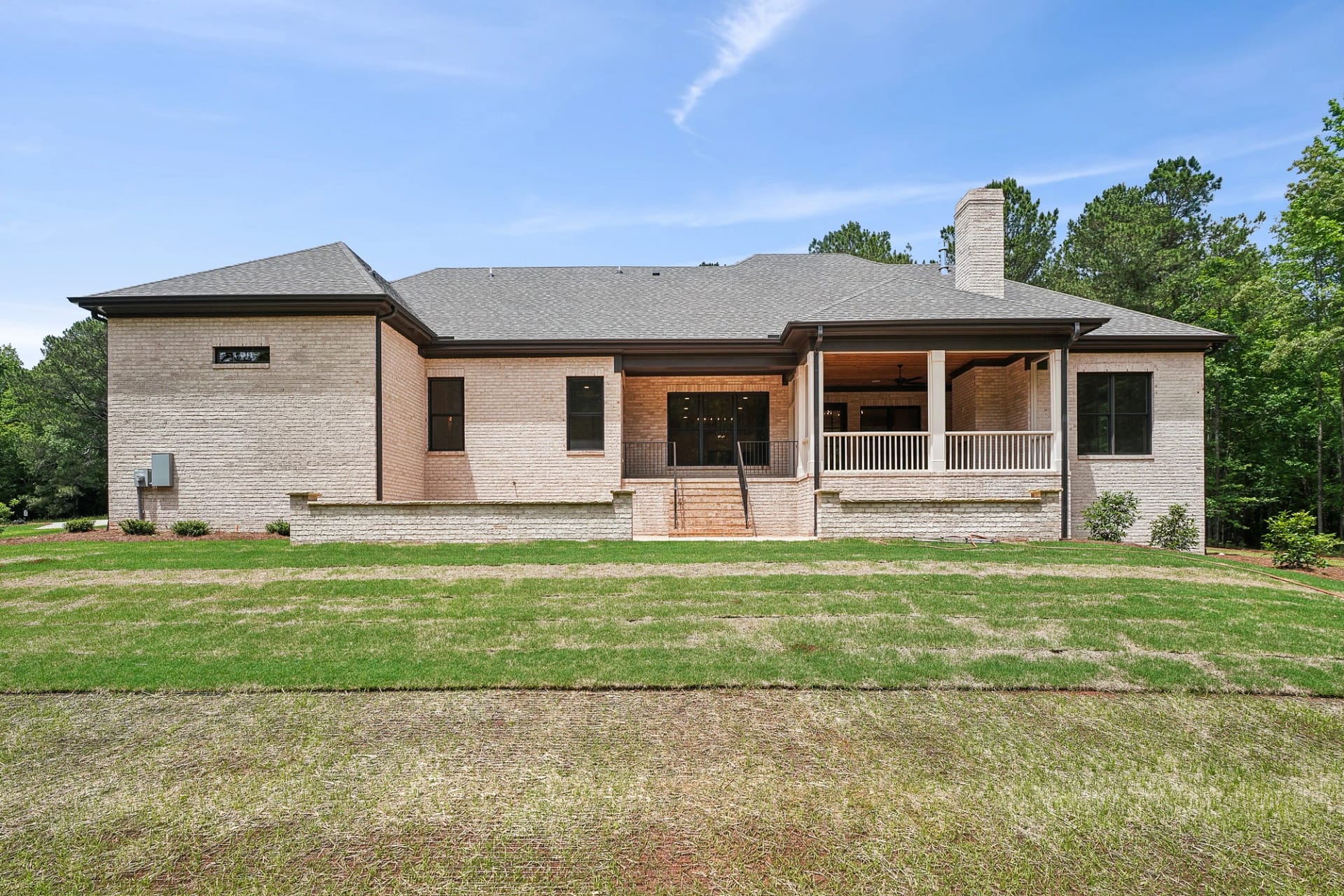 Traditional custom brick home exterior in Holly Springs, North Carolina