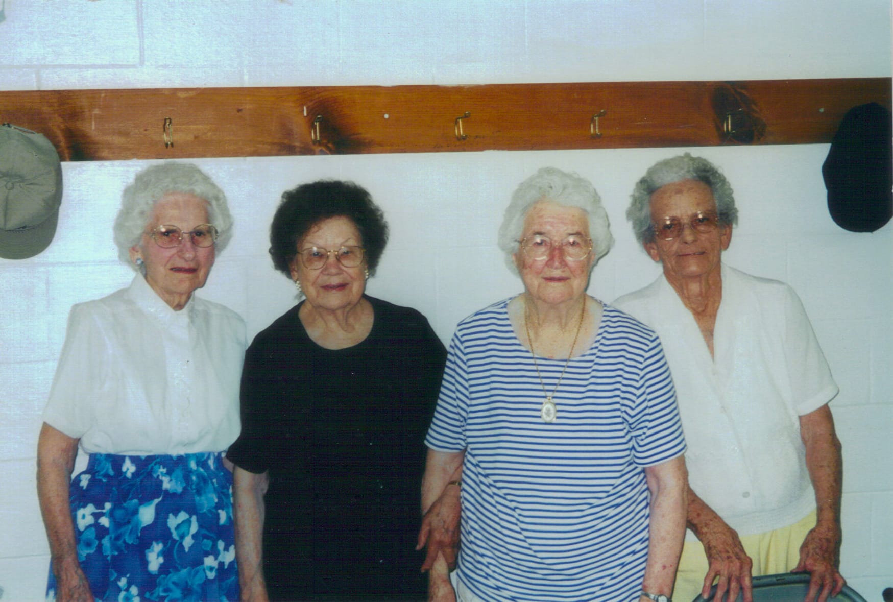 Four women from Rawls Baptist Church in Fuquay-Varina, NC, gathered for fellowship in June 2000, representing a close-knit church family before the expansion years.