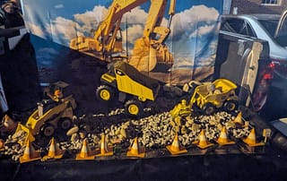 rawls_trunk_or_treat_2025_2 Rawls Baptist Church Trunk or Treat Construction Decorated Trunk with Toy Trucks and Gravel