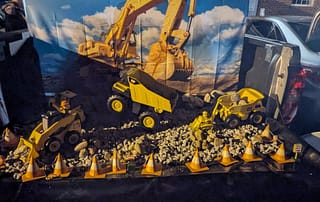 rawls_trunk_or_treat_2025_2 Rawls Baptist Church Trunk or Treat Construction Decorated Trunk with Toy Trucks and Gravel