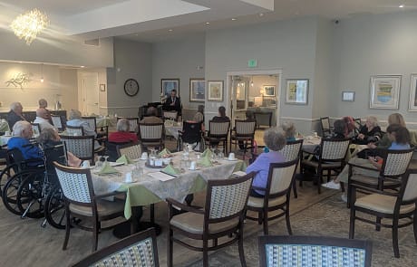 Pastor Brandon giving Bible study at Calyx Pastor Brandon giving bible study at Calyx Living Facility cafeteria.