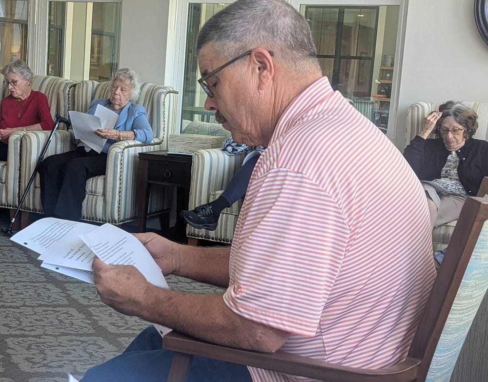 Rawls church member giving bible study at Calyx Living Facility to residents in Fuquay-Varina, NC