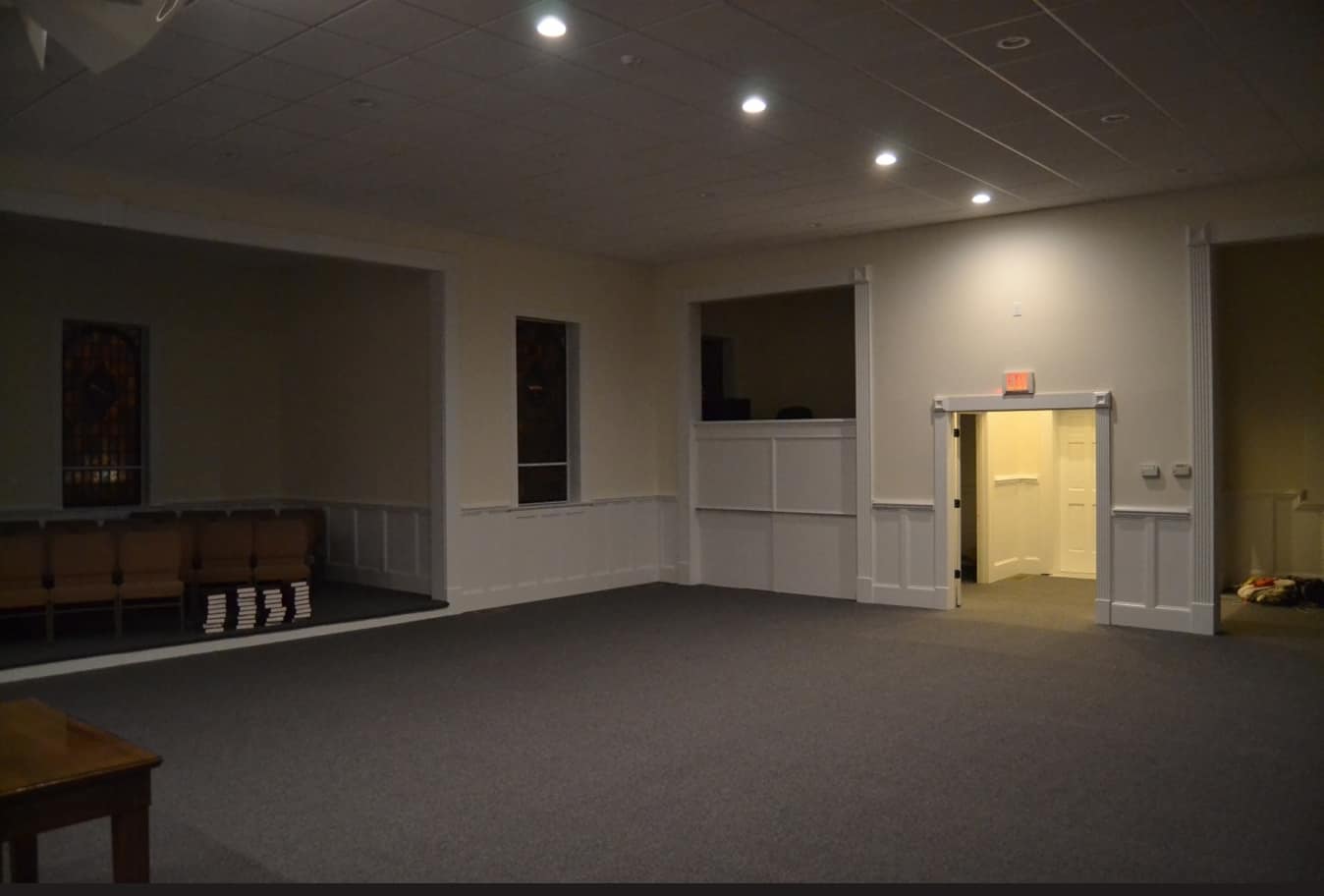 Sanctuary Rear View After Renovation (2014) Updated sanctuary interior of Rawls Baptist Church featuring expanded floor space, new entryway, and renovated side alcoves with modern trim detail