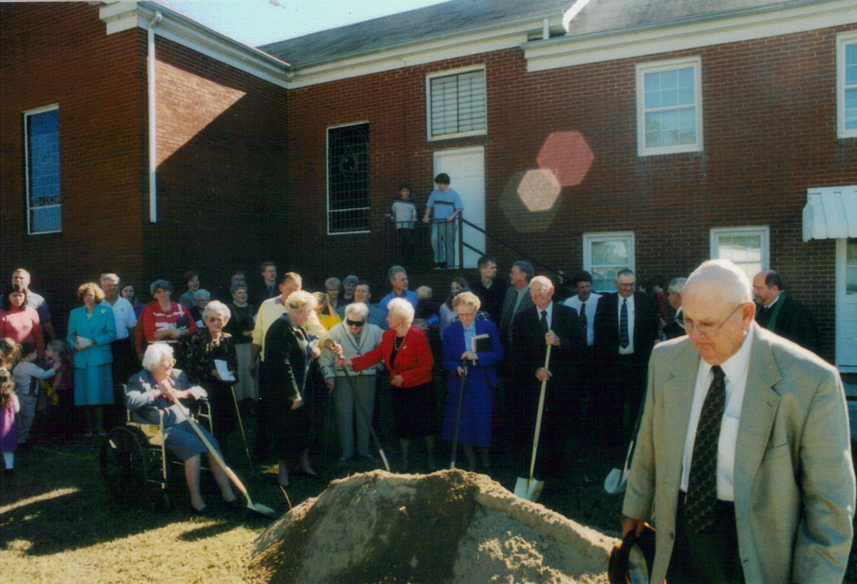 Groundbreaking Ceremony, 2005 Church members and leaders gather outside Rawls Baptist Church in Fuquay-Varina, NC, for the groundbreaking ceremony marking the start of the 2005 building expansion.