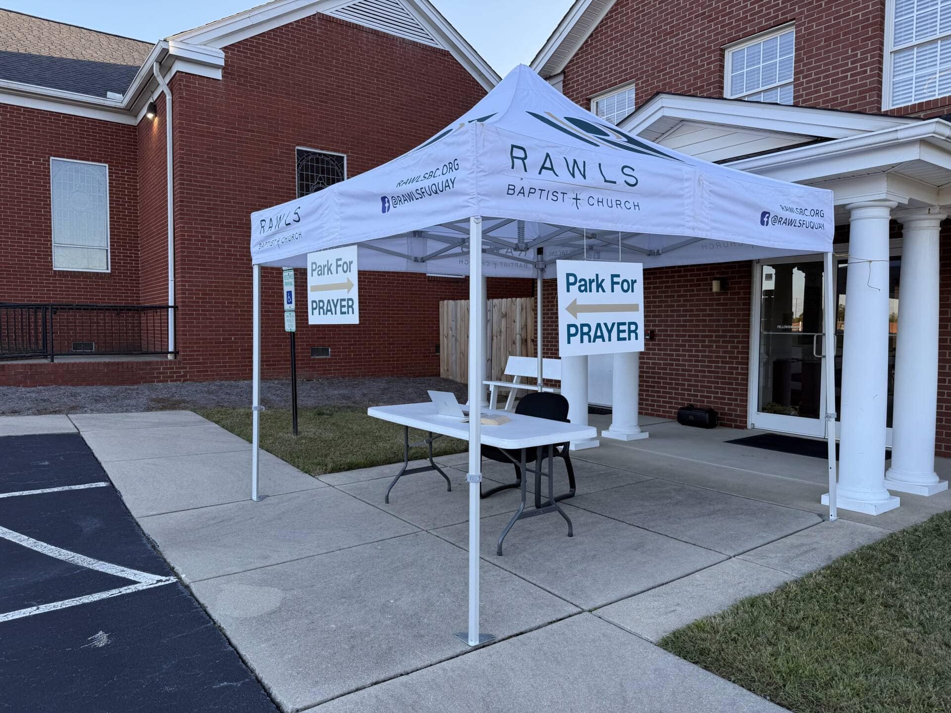 Rawls Baptist Church Park for Prayer tent set up outside in parking lot
