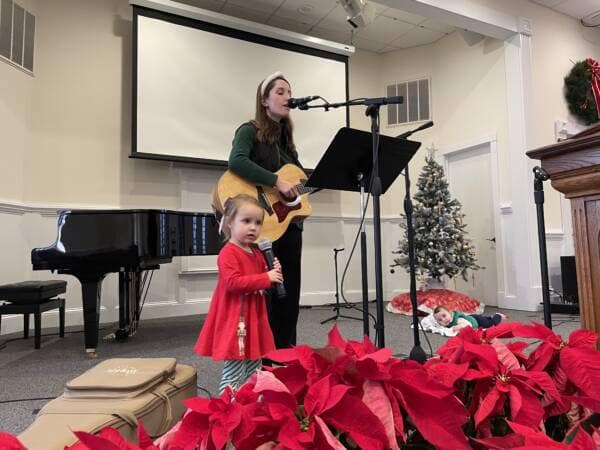 Susanna Gaster, leader of the Praise Team, singing during the Christmas Service at Rawls Baptist Church
